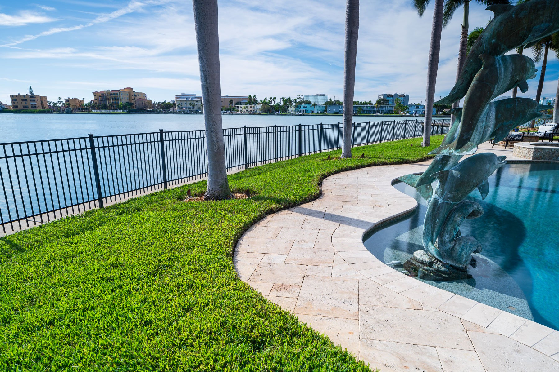 HOA common area landscape maintenance near water pool