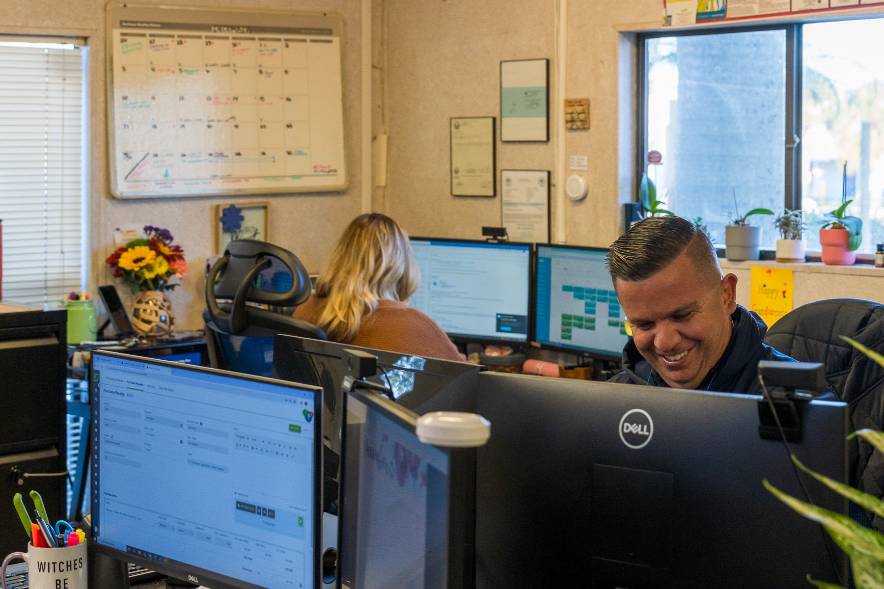 Michael Tomaino sitting at desk in office 